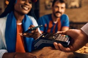Customer paying at a card terminal
