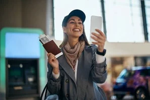 Commuter paying with phone at a station