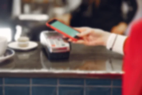 Customer paying with a smartphone